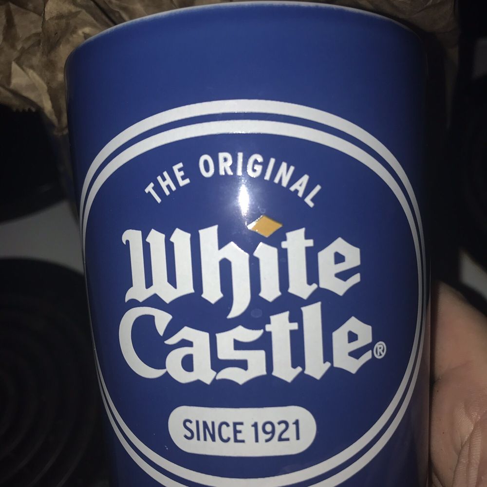 White Castle - a person holding a blue cup - Burgers Near Me - Louisville, Kentucky White Castle - a person holding a blue cup - Burgers Near Me - Louisville, Kentucky
