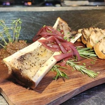 The Cork Tucson - Bone Marrow appetizer with prime rib pate, house picked onions, Barrio Bread - Steakhouses Near Me - Tucson, Arizona The Cork Tucson - Bone Marrow appetizer with prime rib pate, house picked onions, Barrio Bread - Steakhouses Near Me - Tucson, Arizona