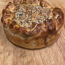 Crazy Stuffed Breads - 6" round 3" deep filled with Homemade Meatballs covered with marinara sauce and some other than mozzarella cheese