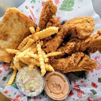Raising Cane's Chicken Fingers - Chicken fingers, fries, coleslaw, cane sauce, and garlic bread - Chicken Shop Near Me - Peoria, Illinois Raising Cane's Chicken Fingers - Chicken fingers, fries, coleslaw, cane sauce, and garlic bread - Chicken Shop Near Me - Peoria, Illinois
