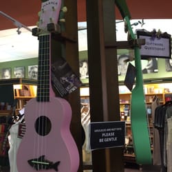 McNally Robinson Booksellers - Colourful, dangling ukuleles