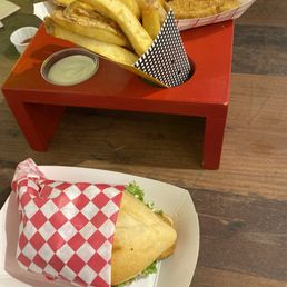 Cod sandwich, Belgian fries and cod fish fingers.