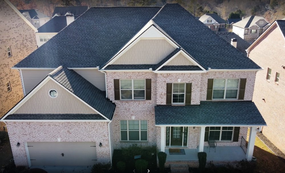 Slide of One Tree Roofing