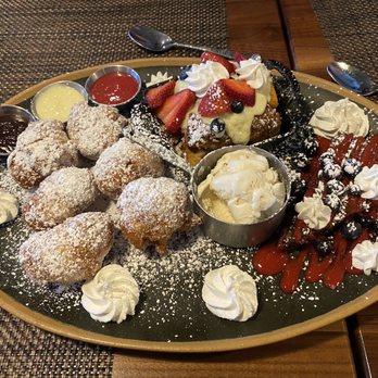 The Clinkscale - Dessert plater with beignets, peach cobbler and flourless chocolate cake....all delicious! - Breakfast & Brunch Near Me - Jerome, Arizona