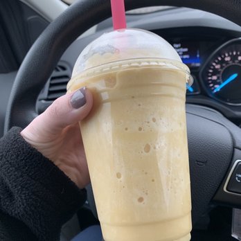 Nutrition 46 - a hand holding a cup of iced coffee - Juice Bars & Smoothies Near Me - Bulverde, Texas Nutrition 46 - a hand holding a cup of iced coffee - Juice Bars & Smoothies Near Me - Bulverde, Texas