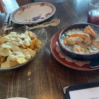 SER - Papas Bravas, garlic shrimp - Spanish Near Me - Arlington, Virginia SER - Papas Bravas, garlic shrimp - Spanish Near Me - Arlington, Virginia