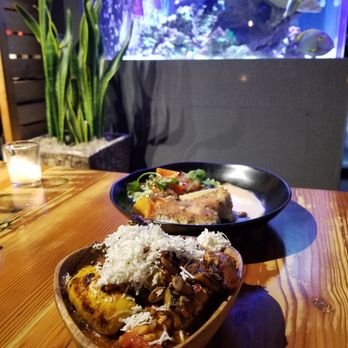 Lechon - Lomo Saltado and Grilled Summer Squash - Tapas Bars Near Me - Portland, Oregon Lechon - Lomo Saltado and Grilled Summer Squash - Tapas Bars Near Me - Portland, Oregon
