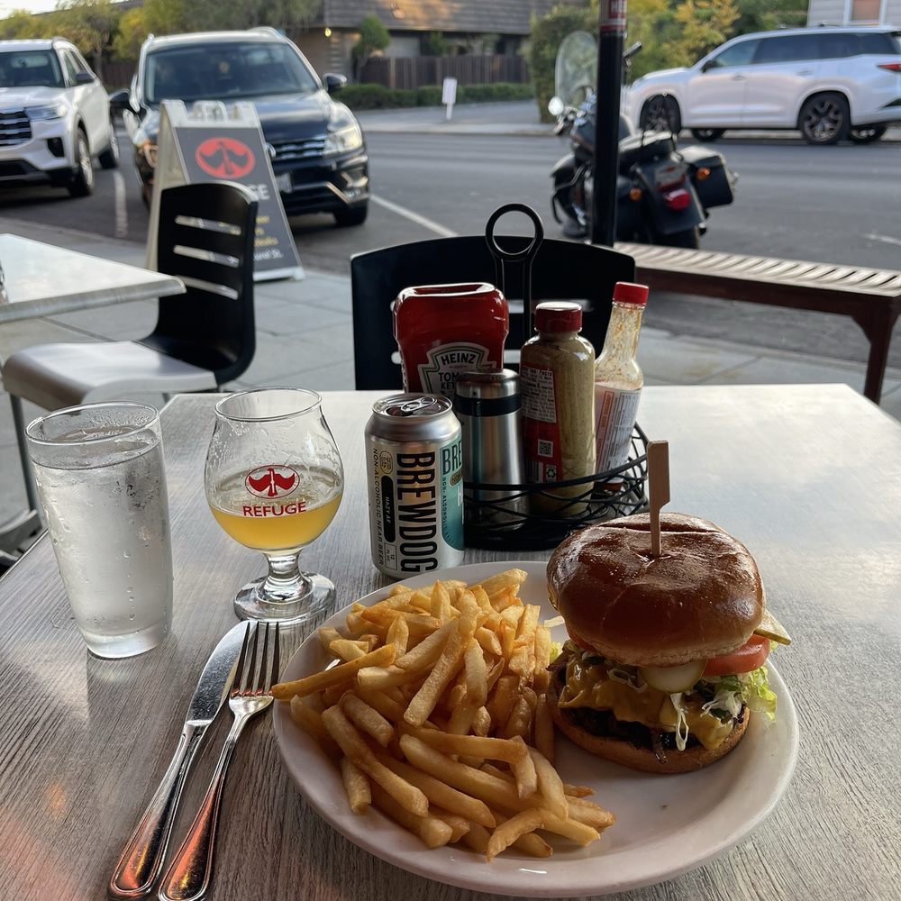 The Refuge - Cheeseburger w/grilled caramelized onions, regular fries, and ranch dressing (which is REALLY GOOD). Non-alcoholic beer. - Burgers Near Me - San Carlos, California The Refuge - Cheeseburger w/grilled caramelized onions, regular fries, and ranch dressing (which is REALLY GOOD). Non-alcoholic beer. - Burgers Near Me - San Carlos, California