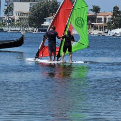 Mike's Windsurfing - Rhonda and Mike cruising on the tandem board Alamitos Bay Long Beach