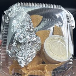 Nom Noms Mexican Grill - Barely any chips (they were stale) , the side of queso I ordered & the Kids Burrito was more foil than burrito!