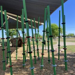 Discovery District Park - Climbing poles