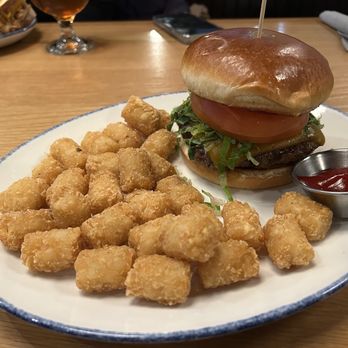 Tangled Roots Craft Beer & Kitchen - TR burger with a side of tater tots - Brewpubs Near Me - Vernon Hills, Illinois Tangled Roots Craft Beer & Kitchen - TR burger with a side of tater tots - Brewpubs Near Me - Vernon Hills, Illinois