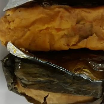 Nuestro Tendita Centro-Americano - A pork tamale and a bean filled.tamale (tamale pisque). Pork tamale is bone in. Very flavorful. - Latin American Near Me - Tampa, Florida Nuestro Tendita Centro-Americano - A pork tamale and a bean filled.tamale (tamale pisque). Pork tamale is bone in. Very flavorful. - Latin American Near Me - Tampa, Florida