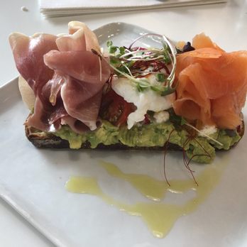 Sydney Providence - Avocado smash toast with all the add on's. Poached egg, smoked salmon and prosciutto. Go big or go home right? - Coffee & Tea Near Me - Providence, Rhode Island Sydney Providence - Avocado smash toast with all the add on's. Poached egg, smoked salmon and prosciutto. Go big or go home right? - Coffee & Tea Near Me - Providence, Rhode Island