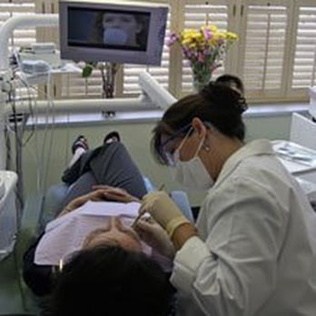 Denise Fundora, DDS - Watching a movie while she cleans - Cosmetic Dentists Near Me - Glendale, California