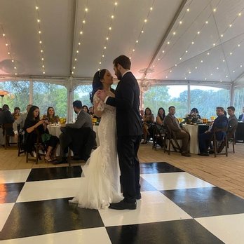 Rainbow Event Rentals - 1st Dance as husband and wife on this gorgeous dance floor! - Party Supplies Near Me - Austin, Texas