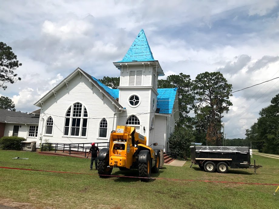 Slide of Tauros Roofing Services