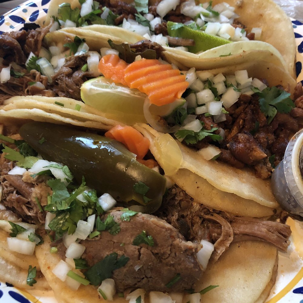Shredded beef and spicy pork combo of 12 tacos. Shredded beef and spicy pork combo of 12 tacos.