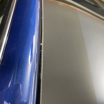 Tesla Motors - Damage caused when using a "cold knife" to cut out the old glass.  It should have been protected. - Car Dealers Near Me - Portland, Oregon