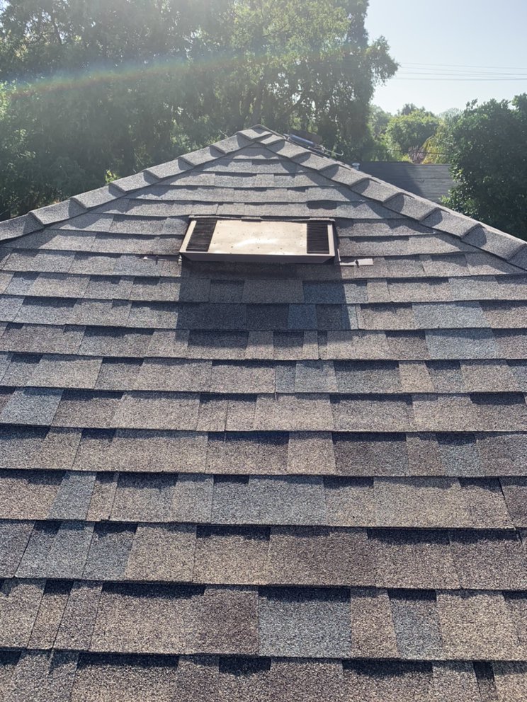 Slide of T&K Roofing