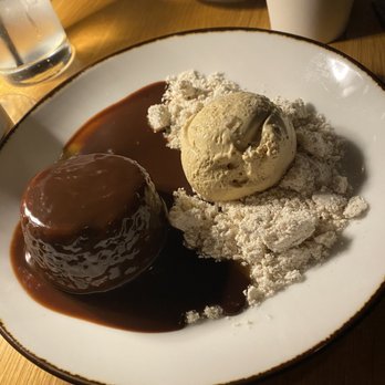 Andrew Michael Italian Kitchen - Brownie with ice cream is - Italian Near Me - Memphis, Tennessee Andrew Michael Italian Kitchen - Brownie with ice cream is - Italian Near Me - Memphis, Tennessee