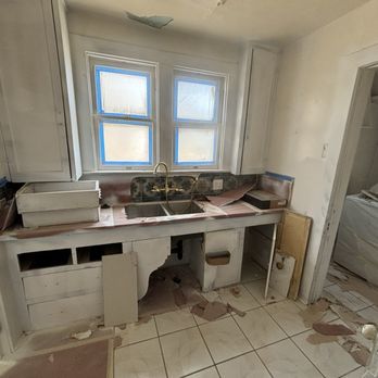 Lee & Company Construction - Old sink area in kitchen before wall and doorway to the right was taken down and new sink, counter, cabinets, floors etc...was built! - General Contractors Near Me - Arcadia, California Lee & Company Construction - Old sink area in kitchen before wall and doorway to the right was taken down and new sink, counter, cabinets, floors etc...was built! - General Contractors Near Me - Arcadia, California
