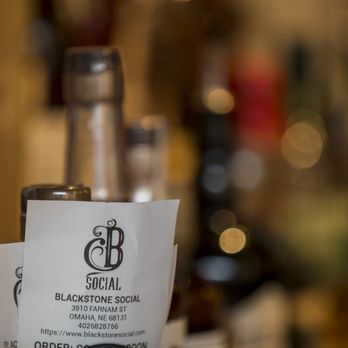 Blackstone Social - bottles of alcohol on a bar counter - Lounges Near Me - Omaha, Nebraska Blackstone Social - bottles of alcohol on a bar counter - Lounges Near Me - Omaha, Nebraska