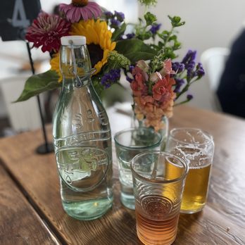Dillon Beach Coastal Kitchen - Beautiful table flowers - New American Near Me - Dillon Beach, California