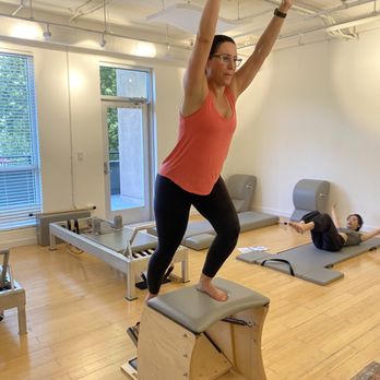 Lift Pilates - Going Up Front on the Wunda Chair at Lift Pilates in Davis, CA -- classical Pilates strength, control, and balance. - Pilates Near Me - Davis, California