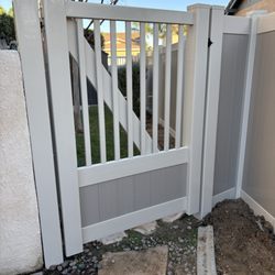 Lifetime Vinyl Fence Fabricators Inc. - Our adobe with tan trim and tan picket top