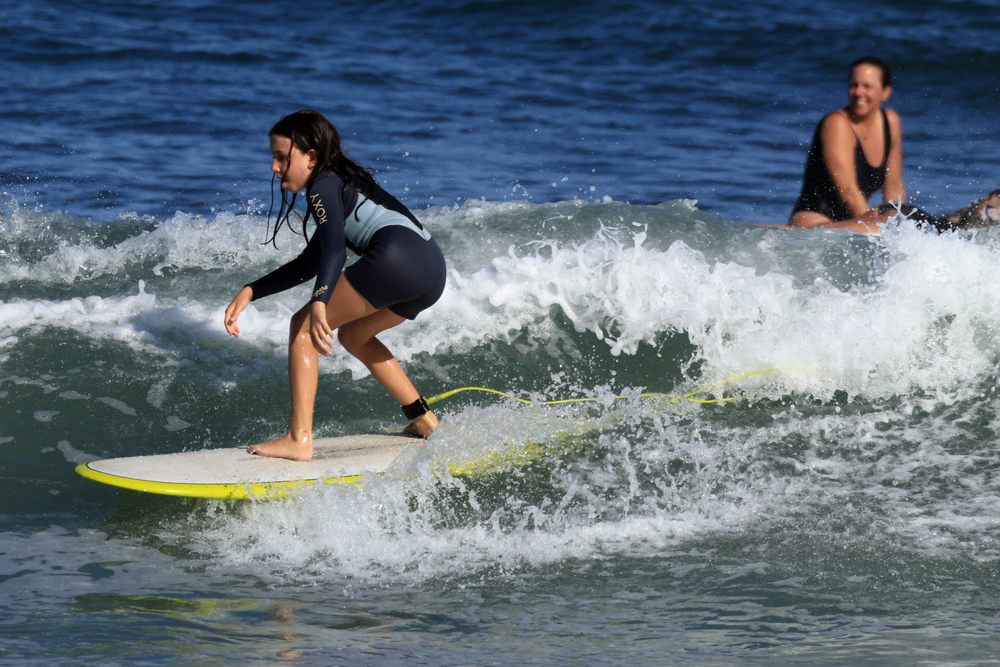 Heaven On Earth Stand Up Paddle & Surf School Logo
