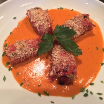 Costa Brava Bistro - Pork-stuffed peppers - the sauce is amazing! - Spanish Near Me - Bellaire, Texas
