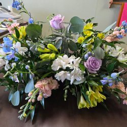 The floral arrangement for the funeral and visitation.