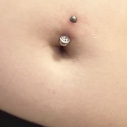 Eternal Tiger Tattoo - Mispierced and infected belly button piercing