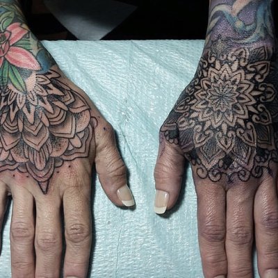 Tattoo Portfolio - Step into a realm where art intertwines with the essence of identity and self-expression. Within these pages lies a symphony of ink, a testament to the mastery of the needle, and a celebration of human canvas. Each stroke tells a story, each design a journey, crafted by the hands of a visionary artist.

Embrace the diversity of styles, from the intricate linework of geometric masterpieces to the bold, vibrant hues of illustrative wonders. Delve into the realms of realism, where portraits breathe life and landscapes evoke emotion. Explore the mystique of black and grey, where shadows dance and whispers of elegance linger.

Discover the fusion of cultures and traditions, where ancient symbols mingle with modern interpretations, forming a tapestry of symbolism and meaning. Witness the evolution of tattooing, where innovation meets tradition, pushing boundaries and redefining artistry with every creation.

Each photograph encapsulates a moment frozen in time, a testament to the collaboration between artist and muse. It's not merely a portfolio; it's a journey through the soul, a visual narrative of individuality, resilience, and the unyielding spirit of creativity.

Enter this sanctuary of self-expression, where skin becomes a canvas and ink becomes poetry. Welcome to a world where art lives forever, etched beneath the surface, waiting to be discovered, admired, and celebrated.