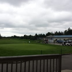 Oshawa Airport Golf Course - First hole is right next to the road, and they have NO safety netting. Course takes no responsibility for damage to cars.