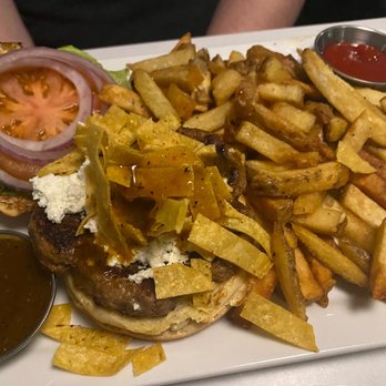 BIN 4 Burger Lounge - Angry bull -- bison burger with chips and piri piri sauce. The sauce is good. - Burgers Near Me - Burnaby, British Columbia BIN 4 Burger Lounge - Angry bull -- bison burger with chips and piri piri sauce. The sauce is good. - Burgers Near Me - Burnaby, British Columbia