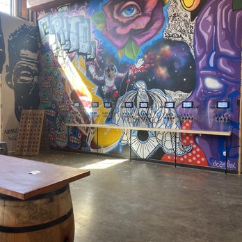 Wanderlust Wine - Shady Lane - Wine tap wall - Wine Tasting Room Near Me - Austin, Texas Wanderlust Wine - Shady Lane - Wine tap wall - Wine Tasting Room Near Me - Austin, Texas