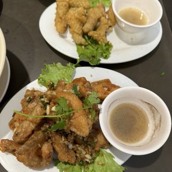 Phnom Penh - Fried chicken wings, garlic squid with lemon pepper sauce - Cambodian Near Me - Vancouver, British Columbia Phnom Penh - Fried chicken wings, garlic squid with lemon pepper sauce - Cambodian Near Me - Vancouver, British Columbia