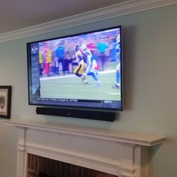 TV Guys - TV Installation with Denon Heos Home Cinema. Remote storage of wifi and cable box in a near by closet.