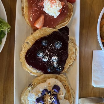 Egghead Cafe - Pancake trio. Hawaiian, blueberry and strawberry shortcake but you can pick your own flavors. They have 5. - Coffee & Tea Near Me - Honolulu, Hawaii