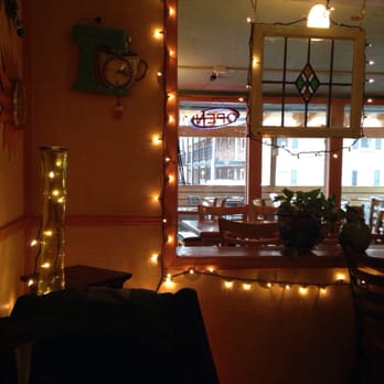 Wild Craft Eatery - The inside of cafe from a corner table for two. Unique coffee mugs & different salt&pepper shakers for each table. Cute lights! - Cafes Near Me - Boone, North Carolina Wild Craft Eatery - The inside of cafe from a corner table for two. Unique coffee mugs & different salt&pepper shakers for each table. Cute lights! - Cafes Near Me - Boone, North Carolina