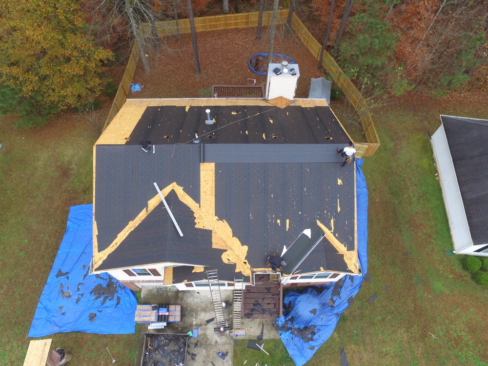 Slide of Empire Roofing & Restoration