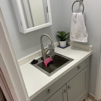 Top Level Construction - Bathroom sink conversion to stainless steel bar sink with garbage disposal - General Contractors Near Me - Waipahu, Hawaii