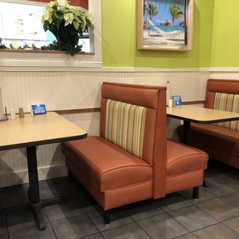 Captain D's - a booth with a table and chairs - Seafood Near Me - Cleveland, Mississippi Captain D's - a booth with a table and chairs - Seafood Near Me - Cleveland, Mississippi