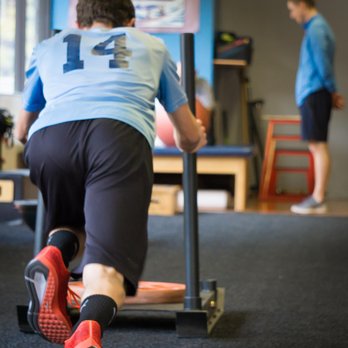 The Physio Shop Flagstaff - Enough indoor turf for a toddlers' pee-wee football league. - Physical Therapy Near Me - Flagstaff, Arizona The Physio Shop Flagstaff - Enough indoor turf for a toddlers' pee-wee football league. - Physical Therapy Near Me - Flagstaff, Arizona