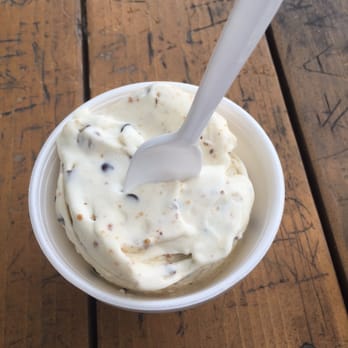 Curly's Frozen Custard - Vanilla concrete with Reese's cup and chocolate chips. - Ice Cream & Frozen Yogurt Near Me - Fort Worth, Texas Curly's Frozen Custard - Vanilla concrete with Reese's cup and chocolate chips. - Ice Cream & Frozen Yogurt Near Me - Fort Worth, Texas