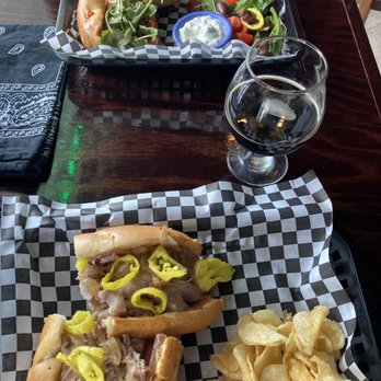 HopScotch Cafe - Sliced pork, Serrano ham, Swiss, Banana peppers, caramelized onions and spicy scotch bonnet aiolis. On a baguette. Yum - Sandwiches Near Me - Dunedin, Florida HopScotch Cafe - Sliced pork, Serrano ham, Swiss, Banana peppers, caramelized onions and spicy scotch bonnet aiolis. On a baguette. Yum - Sandwiches Near Me - Dunedin, Florida