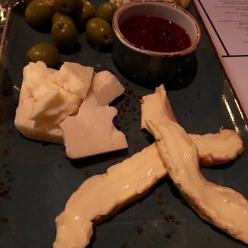 CH Distillery - Cheese plate and olives - Cocktail Bars Near Me - Chicago, Illinois CH Distillery - Cheese plate and olives - Cocktail Bars Near Me - Chicago, Illinois