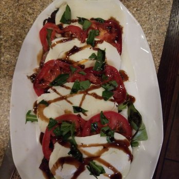 Rockafellers Station - Caprese salad. - Italian Near Me - Long Branch, New Jersey Rockafellers Station - Caprese salad. - Italian Near Me - Long Branch, New Jersey